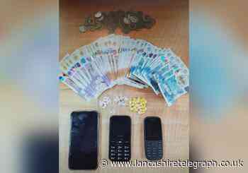 Two arrested after car search found suspected class A drugs and cash