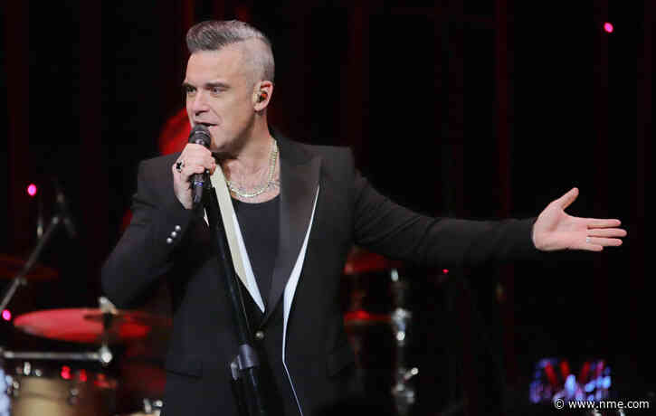 Robbie Williams says he’ll “hopefully” head out on tour in 2022