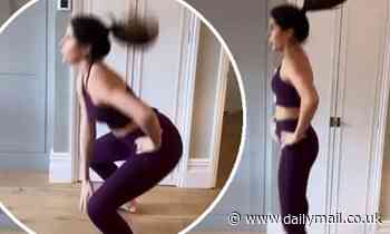 Binky Felstead displays her toned physique in purple gym wear during home workout