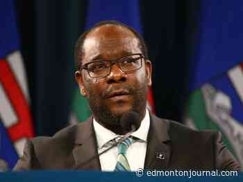 Suspended Alberta justice minister says not guilty of distracted driving