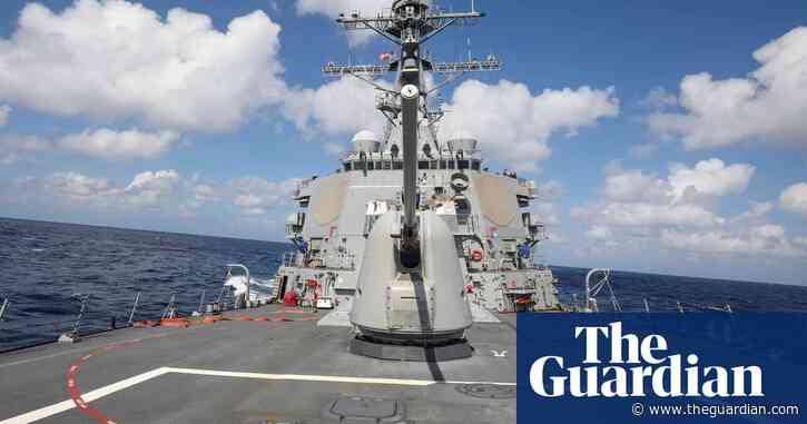 China warns US after tracking warship in South China Sea