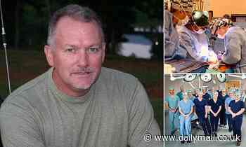 Surgeons successfully transplant two PIG KIDNEYS into a brain dead human