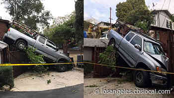 LOOK: Crash Leaves Gardener’s Pickup Truck Stuck Between Hollywood Hills Garage And Wrought-Iron Fence - CBS Los Angeles