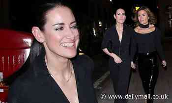 Kirsty Gallacher turns heads in plunging jumpsuit as she rings in her 46th birthday with pals