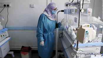 What experts say 2022 could look like on the other side of the latest Covid-19 wave