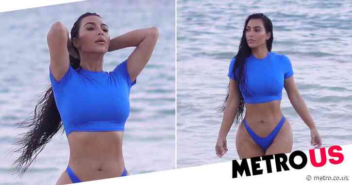 Kim Kardashian stuns in electric blue swimsuit as she poses up a storm for Skims beach photoshoot