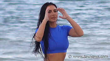 Kim Kardashian stuns in bright blue two-piece swimsuit