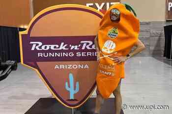 Carrot-suited runner breaks marathon world record in Arizona - UPI News