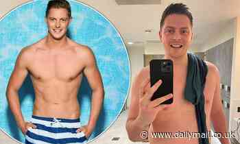Dr. Alex George defies 'fat shamers' with a celebratory shirtless snap 