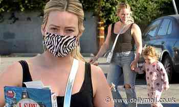 Hilary Duff rocks a tank top and jeans while visiting a book store with daughter Banks in LA