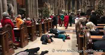 Kritik am Bistum Aachen: Klima-Aktivisten stören Messe im Kölner Dom - Aachener Zeitung