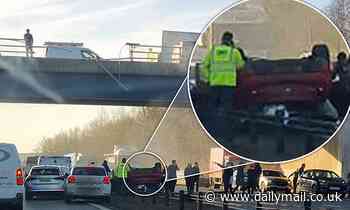 Female passenger in critical condition and driver charged after car falls from bridge onto A1(M)