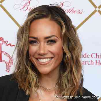 Jana Kramer breaks down in tears during baptism ceremony