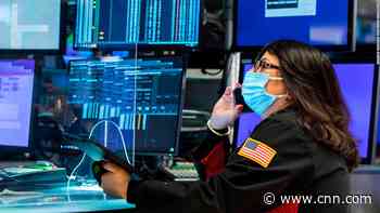 Wild day on Wall Street as Dow erases 1,000-point tumble