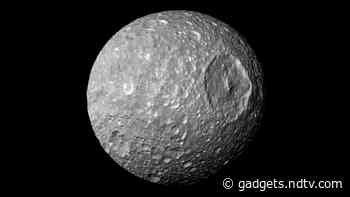 Mimas, a Tiny Moon Orbiting Saturn, Could Be Hiding an Ocean Beneath Its Frozen Surface