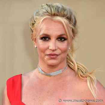 Britney Spears slams paparazzi for 'hiding outside' hotel while she battles stomach bug