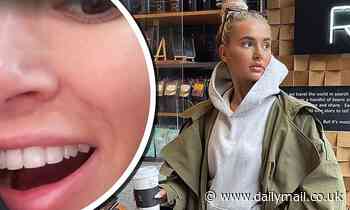 Molly Mae-Hague dons a grey tracksuit as she grabs coffee... following her 'dagger tooth' fiasco