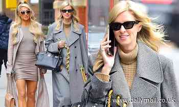 Pregnant Nicky Hilton flashes a smile while stepping out in New York City with sister Paris