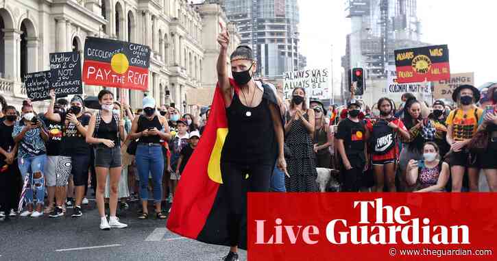Australia news live update: nation records at least 74 Covid deaths; crowds gather for Invasion Day protests; lockdown call for remote NT communities
