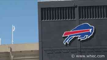Couple charged with using fake vax card to get into Bills game