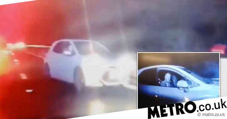Dramatic moment police ram driver going wrong way after U-turn on the M4