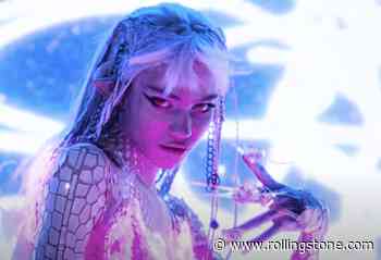 Grimes Is a Red-Eyed Warrior Elf in ‘Shinigami Eyes’ Video