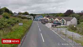 Two trapped inside overturned car in Cornwall - BBC News