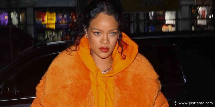 Rihanna Steps Out In An Vibrant Orange Coat After Donating $15 Million To Fight Climate Change