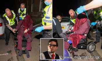 Moment Rhode Island fugitive was tracked down and arrested in his Glasgow flat - Daily Mail