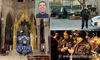 Casket of NYPD officer murdered in Harlem shoot-out taken to St Patrick's Cathedral