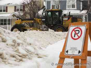 Edmonton snow removal crews working 24-7 to address water pooling around clogged catch basins as freeze-thaw cycle continues