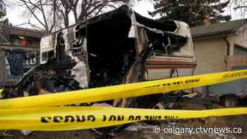 Police investigation underway into RV fire in northwest Calgary backyard - CTV News Calgary