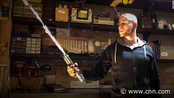 YouTuber creates world's first real-life retractable lightsaber