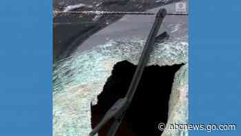WATCH:  Chunk of concrete crashes into driver's windshield