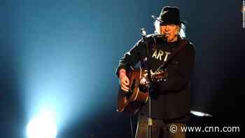 Apple Music trolls Spotify by calling itself 'the home of Neil Young'