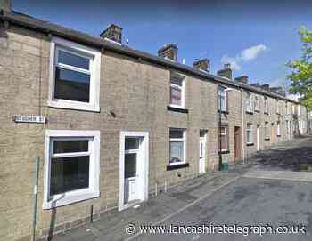 Colne: Gang burst into home with machete and handgun