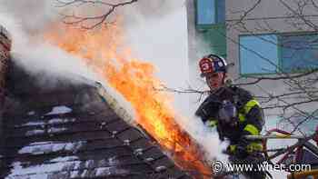 6 people, 2 dogs escape house fire