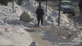 Neighbors still digging out sidewalks as new winter storm approaches