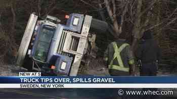 Truck carrying gravel tips over in Town of Sweden, leads to minor hazmat situation