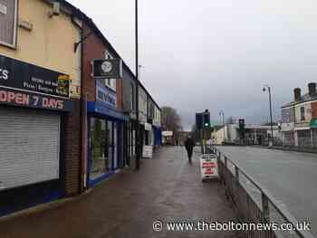 Armed robber at large after hitting Bury Road, Tonge Fold business
