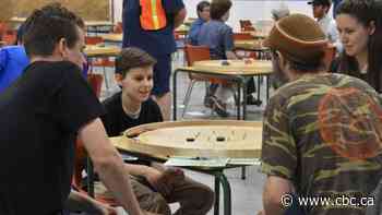 Crokinole becomes an unlikely Canadian export, gaining popularity around the world