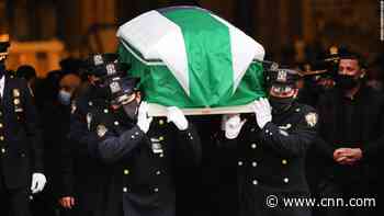 In pictures: NYPD mourns fallen officers