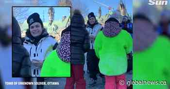 Trucker convoy: Ottawa police seek to identify woman after National War Memorial desecrated - Global News
