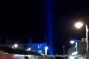 Scots left baffled after huge blue laser beam spotted lighting up the sky near Dundee... - The Scottish Sun