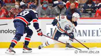 Nugent-Hopkins scores 2 goals late to lead Oilers past Capitals