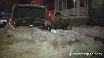 Rochesterians dig their cars out ahead of Thursday's snowstorm