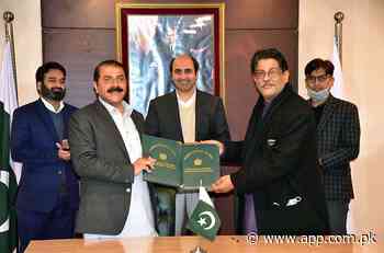 Managing Director PBM, Malik Zaheer Abbas Khokhar and Director Fatima Jinnah Women University, Dr. Shoaib Akhtar exchanging the documents of MoU to support the deserving students in FJWU - Associated Press of Pakistan