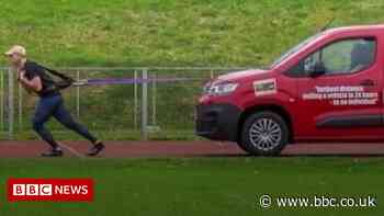 Blackpool pair celebrate world record for pulling van