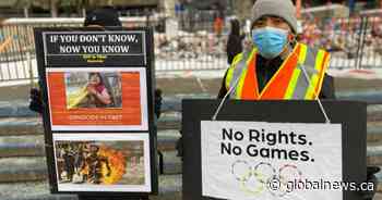 Calgarians mark opening of 2022 Beijing Games with celebration, protest