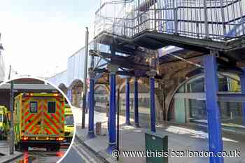 Man rushed to hospital after being by train at Brixton station